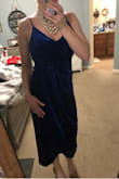 This dress is great and very flattering. It's conservative at the top which I do have a larger bust. Medium fit well I may have been able to do a small because the abdomen area is a little loose but still looks great. - Jackie C.