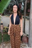I wore this suit as a top/bodysuit with my favorite sheer pants. I have a long torso and can't typically do one pieces, but this was VERY comfortable and flattering. - Krystina M.