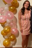 This dress is so comfortable. It's not too short or long. It hits at just the right length. The bows on the shoulder add a cute touch! - Lily M.