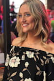 This off the shoulder top flows nicely and the open cut in the back gives it sex appeal. Plus looks great with high waisted jeans! - Ashley B.