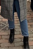 With the shape and height of the boot it's really easy to dress these up or down. The leather quality obviously isn't the greatest and they scratch easily. I would have gone up half a size if I could have because I use thicker socks for the fall/winter. - Andrea S.