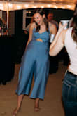 I LOVE this jumpsuit. Wore it to my college graduation party and it was so comfortable and so cute. The side slits on the legs make it so breathable and easy to dance in! - Jenna S.