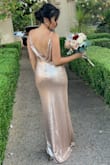 This dress was so beautiful. I loved it! I usually wear size small but this was a tiny bit loose. I could have worn an XS for a perfect fit. It was very comfortable and I received a lot of compliments. It is very long. I wore pretty tall heels and still could have gotten it hemmed. - Alyssa C.
