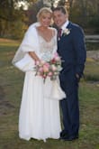 This dress was just perfect for our second wedding. Because the top was sheer I added a nude lining to be more appropriate for a mature bride. It also needed to gave the straps shortened and hemming. It was an early November New England wedding so I also used a faux fur stole which completed the look. The white is a soft white not a stark 'Blue white' which I really liked. The beauty and sparkle of the top of this dress cannot be captured in photos. It's absolutely stunning in person. The dress looks like it costs 5 times what I paid. Everyone complimented the dress all evening including wait staff and vendors. Buy this dress, it looks fabulous on all ages! - Paula M.