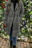 I love everything about this jacket. The length is perfect on me and I got a size bigger so that I can wear chunky sweaters underneath. Going up a size didn't seem to affect anything else but the arms on me so it was perfect. It's great for early winter and fall in Toronto! - Andrea S.