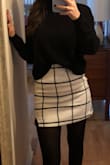 I purchased this skirt to wear for Christmas this year and it was absolutely worth it! The material is thick and warm which is perfect for winter and it paired nicely with my black turtle neck. I would say it fits true to size but if you're debating between two sizes get the smaller one. - Lisa J.