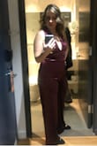 Wore this to a NYE wedding and I absolutely loved it! I had to hem the pants as they were quite long even with heels. Other than that, it fit perfectly and was very flattering. The velvet is light and stretchy and the waist slims you down. I wish I could wear this all the time! - Krista V.