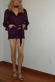 This is just another item I just love from Lulus. I really do not have many purple items and I really love the color. For me the fit overall is really good. The bottom part is pretty short so just be careful and wear the proper under garments. I love the light material and as always the long sleeves work for my arms. The outfit also works well with heels or boots. - Gretchen M.