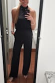 I wore this to a grooms dinner! I LOVE IT!! It is so light weight and fit me perfectly. I went with shorter heels so it went to the ground. It was so comfy and I got a lot of compliments. I am glad I took a chance on this jumper! - Ashley L.