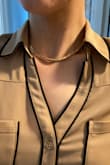 Simple necklace really makes an outfit pop with just a little bit of gold! - Lauren T.