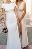 I wore this to my sisters civil wedding ceremony and it was amazing. It fits perfectly although I normally wear a Medium, ordered a Small after looking at other reviews and was happy I did. It could be a little long and heavy if it was a larger side. It's super comfortable and easy to dance in. :) - Cecilie W.