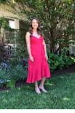 I bought this dress for a wedding on Long Island, NY and it looked great! I was nervous buying it because of the fit and wrap concept. I bought a small, I usually wear a Medium in dresses or size 6. It was the correct size for me. They wrap was confusing to figure out at first, but I went with a side tie. I would say that it was too much cleavage for me personally from my perspective. From the photos it looked fine, but I personally felt like my chest was about to fall out. I wore sticky boobs with this dress, dress tape and I ended up safety pinning the middle so it wasn't showing cleavage too far down. I feel like the top part of the dress needed to be made to be higher up, but adjusting the straps didn't change what I needed to change. Length was fine too. It was comfortable if you are not concerned about your chest hanging out. Easy enough to iron, if you know what you are doing. It also has a lining, with the fabric not being to bulky or too thin. - Abigail F.