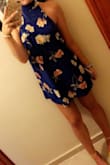 This is a beautiful dress. It is fitted and flowy in the right places , and was a perfect length for me. I have been looking for a high neck dress that is not too low in the under arm area and this was perfect. The color was very vibrant, perfect for a vacation dress. - Abigail J.