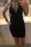 This is a great cocktail dress! Very comfortable and fits great! I can't remember if other reviews said it was too short, but I didn't think so at all. Then again I am short so dresses are usually to long. Shows just enough cleavage, not too much and it holds everything in. No bra needed! - Tara B.