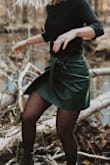 This skirt is so cute and the vegan leather is very soft. My only complaint was that when I buckled the second button to wrap it there was a gap on my hip where the button was because it didn't fold all the way. - Whitney C.