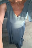 This dress fits perfectly! It's definitely long so I'll be able to wear it with heels, but it's not too tight and not too loose. The material is very soft and it's comfortable. - Alex B.