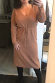 At first I wasn't sure - the key was to not tie the tie super tightly, just more loose. Looked cute with knee high suede boots! - Maria