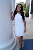 Wore this on graduation day, absolutely loved it! Fits true to size. Comfortable. Not see-through except wear nude undergarments. - Covington D.
