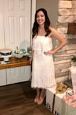 I wore this for my bridal shower and it made me feel beautiful! The material is quality and doesn't show any unflattering parts or hug your body too tightly. I wish it was a little smaller because I had to pull up the strapless top throughout the night, but I am so glad I bought this dress! I highly recommend it! - Tara R.