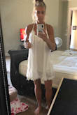 I bought this dress for a beach wedding and kept it simply for a swimsuit cover up. It is short and flowy and super cute! Great material! - Jenni B.