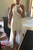 I bought this dress to elope in and it fits so perfectly and is so flattering. It could easily be used again for a white night party. I just love it!!! - Jenni B.