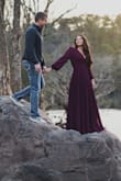 I love this dress! I ordered it to wear for my engagement pics. I ordered a small when usually a medium and it fit perfect! You can adjust how tight you want it since it's a wrap. - Hillary C.