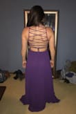 Love it! It is quite long and will need to be hemmed. I love the dress, my bride loves it and it was affordable! - Sumer S.