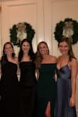 The green is gorgeous!!! Not as dark as it looks in the photo, more green and it's beautiful! Dress fits perfectly! Stretchy around arms so not too constricting. But dress also holds shape all night! Received so many compliments! Everyone should buy this dress! - Catherine F.