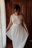 This dress was absolutely perfect for my relaxed country wedding! It was light and cool for our 43 degree celcius wedding day. I got red dirt all over it which easily came out. Naturally suited my curvy shape. Plus it beautifully fans out when you twirl!
I wore stick on bras to keep my 'girls' up for 8hrs, which ensured I didn't get that tucked material look under my 'girls' like some. I also had it hemmed slightly & taken in around the bodice. 
My dress was shipped out to Australia and arrived exactly when stated in the shipping information. 
Couldn't recommend this dress or Lulus higher! - Chloe D.