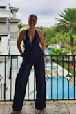 Georgeous jumpsuit, I love the color, the material, the wide legs, the pockets and the sequin top. You can adjust the back straps. High heels required :) - Andrea P.