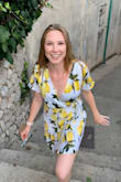 The cutest vacation wrap dress. It is short but perfect for a summer look. - Nicole W.