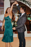 This dress is super fun and unique and perfect for holiday events. It's very comfortable and stretchy material. I will say I wasn't expecting it to be quite as clingy around the hip area. It's just not quite as flowy as it looks. Other than that it's a great dress and I'd wear it all over again! - Katie P.