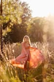 I love this dress. Very boho feel. This was perfect for my engagement photos. If you have a larger bust you may want to pin the dress where it wraps. - Anne M.