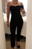 This is the first jumpsuit I've ever tried on, and I was nervous to purchase online. Lulus return policy is fantastic, though, so I figured "why not?" This piece fits me like a glove! Highlights my curves without accentuating my tummy area, which I'm always self conscious about. I said it runs a little large because while it fits me like a glove, it should be too small according to the size chart. Per the size chart, a small fits a 33"-34" bust (I'm 34A/B), which makes sense (btw I am seriously small chested, and this never fell down all night), 26"-27" waist (I'm 29" waist). and 36"-37" hips (I'm 40"). I did hem it about /2". I loved the tighter fit, and it was very comfortable. So glad I took the leap! - Jennifer Z.