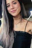 Literally my favorite black tank! The tiny lace detail & fun back make this top show some personality! Absolutely love it! - Mariah M.