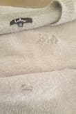 I wanted to love this. Super soft and cozy. Big and bulky but still loved it. Only wore it to lounge in. First wash the material thinned out and shredded on arm. Second wash another big hole appeared on the front middle of the sweater. Very disappointed. Tossed it out. - Debbie C.