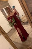 I'm a pretty petite woman, so a small fit me snug! A little tight in the breast area, but my are larger for mine size! Was a bridesmaid in a wedding and everyone loved this dress! - Courtney O.