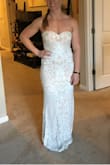 I purchased this dress to try on for my upcoming intimate beach wedding ceremony. It currently feels a little snug on me and I will probably need to wear shape wear underneath, but I was pleasantly surprised by how much I like It in photos. - Katelyn E.