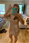 Everyone at the Christmas party loved my dress. It did have a ripple down the zipper(this is what stretchy sequin fabric does when it's pulled tight). However, I feel if I sized up it would not have fit like a glove. TONS of compliments on my dress. I'm in love with LuLus. Happy to have discovered this store. The dress was high quality for the price. - Juliann C.