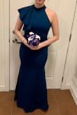 I felt so sexy in this dress! It def hugs every curve but in a forgiving way. Wish I could have kept it but the bride said it was "too green" for her bridesmaids color palette. I tried the medium as well and it was very loose on the top. - Colleen B.