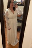 I crossed my fingers in hope that this would be THE dress for my wedding! It is! I absolutely love it! I cannot wait to wear this on my wedding day! I will only have to get the bottom and the sleeves taken up a little. - Alyssa A.