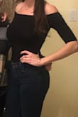 This shirt can be worn with something casual or more dressy. I really enjoy it and the versatility of it. It fits well and pretty true to size. The only thing to be aware of is the shoulder area is a little snug so if you have wide shoulders it might be a bit tight. - Mallory S.