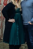 Beautiful dress but has no give! I wore it to dinner and after I ate I felt like I couldn't breath so just keep that in mind. Otherwise I love the color and fit. It's a good option for fuller hips. - Kat R.