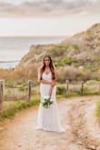 As soon as I put on the dress, I knew it was the ONE!   I didn't have to make any alterations and the price is amazing.   It photographs so well and everyone loved my dress.   Don't hesitate on buying this dress for your wedding.   I wore it for the photo shoot and the wedding.  PERFECTION!!!! - LaMisha C.