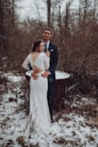 This was the wedding dress of my dreams. I'm a thrifty girl who threw a beautiful, small, brunch wedding and I felt like a princess in this dress. I had minor alterations: shortened and slightly lifted in the shoulders. Nobody could stop talking about this dress and in the pictures it looks like an expensive designer gown. I hope Lulus never stops selling this dress...it will make many a bride happy. - Adrienne B.
