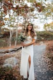 This dress is absolutely amazing. I bought it for my wedding. It's simple, classy and beautiful. I got so many compliments and I felt gorgeous in my special day - Ana P.