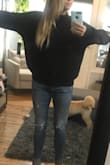 I'm exchanging it for an XS because it runs very large. The photo is of the small, I normally order a medium and sometimes a small if it runs big. Super cute neck line, classy, comfy, work appreciate. It's not too heavy, perfect weight to the material. - KATELYN L.