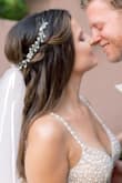You are on this site, looking through all the reviews, hesitating to buy your wedding dress online, and I am here to tell you YES YOU CAN. A little unconventional from the mainstream of going into a store, that's true. My advice, if you have enough time in your timeline, order the dress, try it on, and if it doesn't blow you away then return it. I went to a store, tried on dresses, and nothing felt like "The One". After that I decided to look online and found this gem. I got so many compliments, and it just fit my style.
Couple of highlights from this dress:
- fun to dance in
- pretty beading
- sexy, but classy at the same time
- affordable
- Plus, if you are bloated no one will notice
I did get it tailored because it was a bit too long even with my heels. The straps were shortened so it fit a bit tighter on the top, and the lady added some extra clips in the lower back to be more fitted. Hope this helps you in your process! - Agar H.