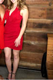 I LOVED THIS DRESS!!!!!!! So many compliments in it! It fit really well. The bust was bigger + lower than I expected, so I just pinned it a little higher / tighter! Crossing in the front gives you a great shape. True red. - Grace D.