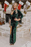 I wore this dress for a Holiday Gala! It was perfect. Loved the color. Fit perfectly. Little tight in the arms but wouldn't of sized up. - Kacy H.